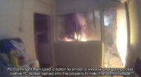 Two quick-thinking police officers smashed their way into a burning house to save a sleeping woman after spotting smoke while on a routine patrol