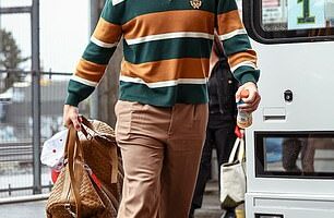 Travis Kelce donned an orange outfit that fans are convinced was a nod to Taylor Swift