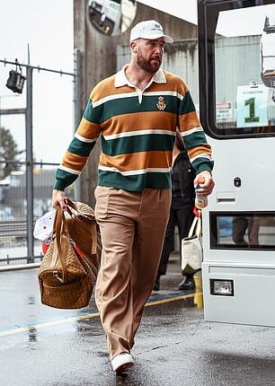 Travis Kelce donned an orange outfit that fans are convinced was a nod to Taylor Swift