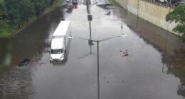 Flash floods trigger travel misery as hundreds of flights are canceled or delayed: Live updates
