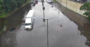 Flash floods trigger travel misery as hundreds of flights are canceled or delayed: Live updates