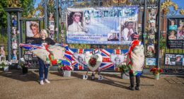Royal fans were sombre as they gathered outside Kensington Palace to mark Princess Diana 's death anniversary after a fatal car crash in Paris claimed her life 28 years ago