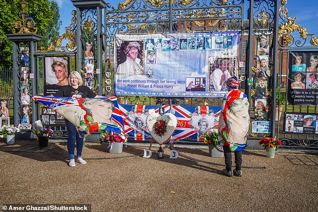 Royal fans were sombre as they gathered outside Kensington Palace to mark Princess Diana 's death anniversary after a fatal car crash in Paris claimed her life 28 years ago