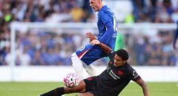 A former Liverpool star clashed with Cole Palmer after a heavy tackle during Chelsea's friendly on Friday evening