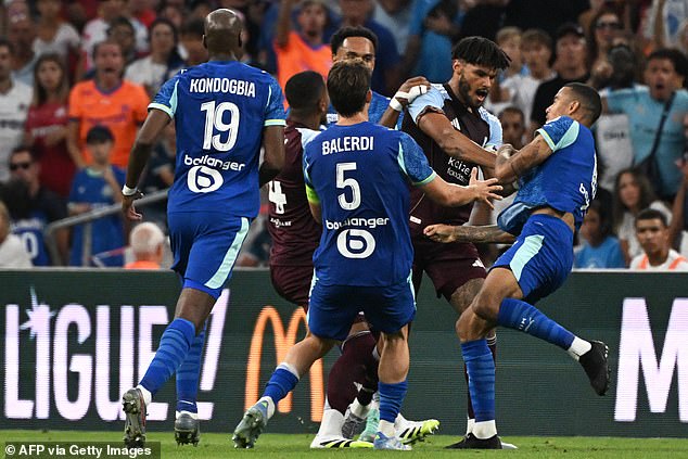 Former Man United forward Mason Greenwood had his shirt ripped by Tyrone Mings as tempers flared in a pre-season friendly