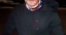 A man suffered a severe gash and blood streaming down his face after he said he was attacked with 'a glass bottle containing a lit rag' after he put up England flags in Stevenage, Hertfordshire