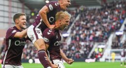 Harry Milne leads the celebrations after Hearts take the lead against Aberdeen at Tynecastle
