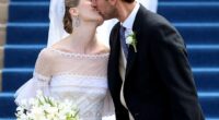 The happy couple (pictured) sealed their vows with a kiss on the steps of the cathedral after their wedding ceremony