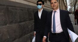 Ryan Yi Cho (left) and his lawyer George Balot after his legal team secured his release on bail on Friday