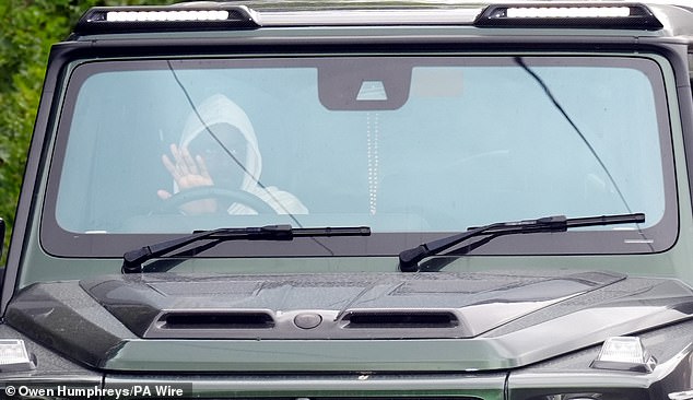 Alexander Isak pictured driving out of Newcastle United's training ground on Wednesday