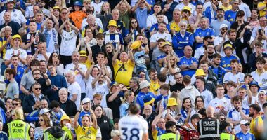 Harrison (38) applauds the Leeds fans at full time in Dublin after the friendly against AC Milan