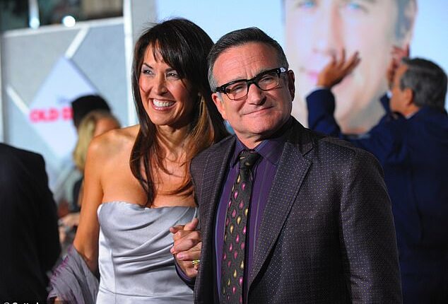 Robin Williams (right) was diagnosed with Lewy body dementia (photographed in 2009 with his wife, Susan Schneider)