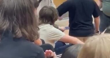 Viral footage shows the hulking Lincoln High School student throwing punches at a staff member before being slammed to the ground