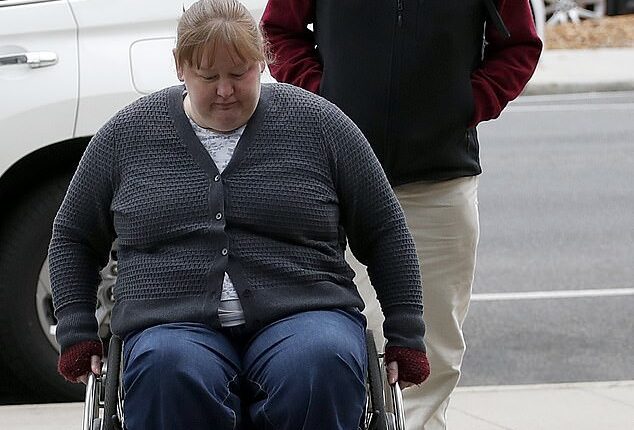 Ian Wilkinson, the sole survivor of the Leongatha mushroom poisonings, comforted his daughter Ruth Dubois (front) in court on Monday as she delivered her victim impact statement