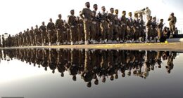 Leaders of Iran's Revolutionary Guards are said to have asked Afghanistan 's warlords for 'access' to the bombshell list at the centre of a two-year super-injunction drama in the UK (Pictured: File image of Iran's Revolutionary Guards in 2007)