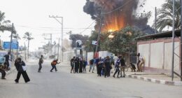 Palestinians flee as Israel warplanes strike an area where displaced residents live