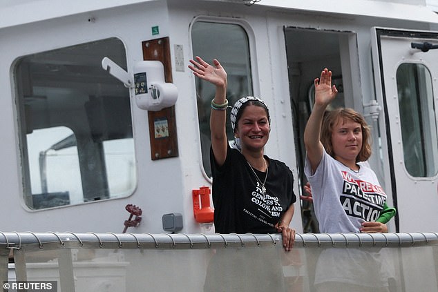 Swedish activist Greta Thunberg waves while departing on the Global Sumud Flotilla, a humanitarian expedition to Gaza, at the port of Barcelona, Spain August 31, 2025