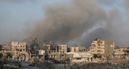 Smoke rises above the sky in Gaza in the aftermath of Israel's strikes on Thursday