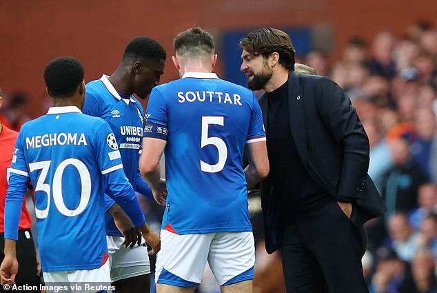 Rangers manager Russell Martin speaks to his skipper John Souttar during Tuesday's play-off