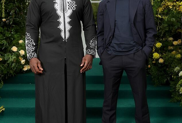 Jermaine Jenas made a rare public appearance following his axe by BBC bosses last year as he attended the glitzy GRM gala with boxer Derek Chisora on Tuesday