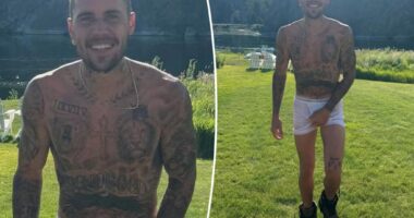 Justin Bieber has his hands full in nothing but tighty-whities and combat boots