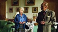 The late Queen Elizabeth and Prince Philip are pictured beaming at someone off-camera as they spent their summer holiday at Balmoral Castle