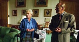 The late Queen Elizabeth and Prince Philip are pictured beaming at someone off-camera as they spent their summer holiday at Balmoral Castle