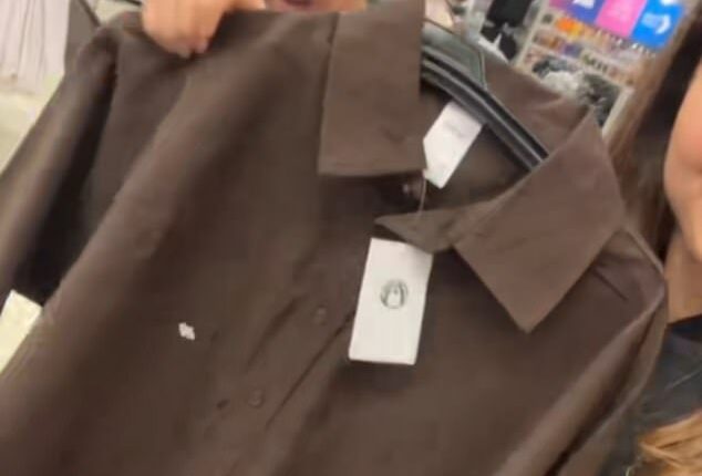 The viral $25 Oxford Long Sleeve Shirt is back at Kmart - and this time the new 'It' top comes in chocolate brown