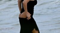 Kourtney Kardashian proudly showed off her pert derriere in a thong swimsuit while on a family holiday just weeks after personally putting an end to pregnancy rumors