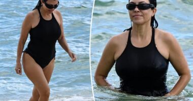 Kourtney Kardashian rocks thong swimsuit after pregnancy rumors