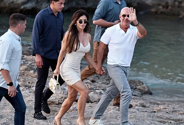 Lauren Sanchez struggled to keep her footing during a double dinner date with husband Jeff Bezos as pair are joined by Leonardo DiCaprio and Vittoria in Ibiza on Sunday