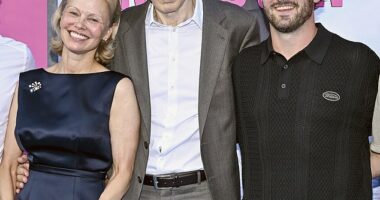 Liam Neeson's (M, pictured last Monday) son Daniel Jack Neeson (R) reacted to his surprising romance with his Naked Gun leading lady Pamela Anderson (L), by commenting on her Instagram post featuring the coy couple last Friday