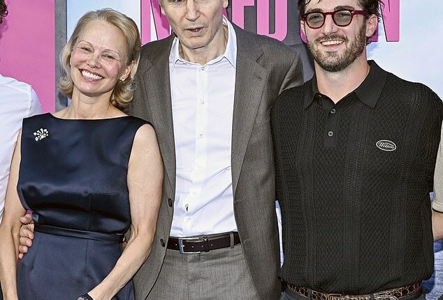 Liam Neeson's (M, pictured last Monday) son Daniel Jack Neeson (R) reacted to his surprising romance with his Naked Gun leading lady Pamela Anderson (L), by commenting on her Instagram post featuring the coy couple last Friday