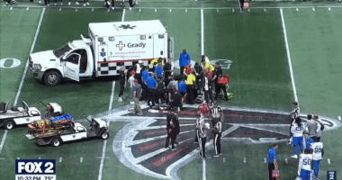 Maurice Norris getting carted off the field.