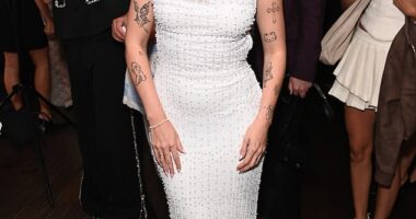 Lottie Moss cut an elegant figure in a white beaded dress as she led the stars at the Materialists gala screening at Picturehouse Central in London on Tuesday night