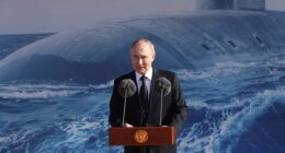 Russian President Vladimir Putin speaks while visiting the Sevmash Shipbuilding Plant, on July 24, 2025