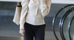 MCoBeauty founder Shelley Sullivan, 51, (pictured) displayed her dramatic weight loss as she arrived back in Sydney following Hamilton Island getaway on Thursday