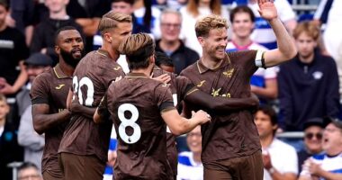 Man United, Liverpool and Tottenham are all targeting a move for Brentford'S Nathan Collins (R)