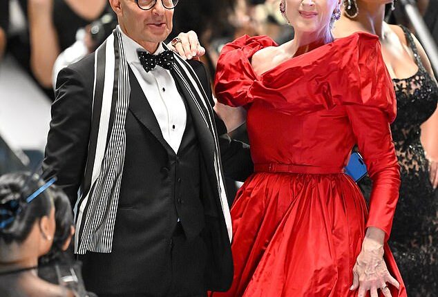 Meryl Streep put on a very glamorous display in sweeping red gown as she joined Stanley Tucci on set of Devil Wears Prada 2 before filming in NYC on Friday