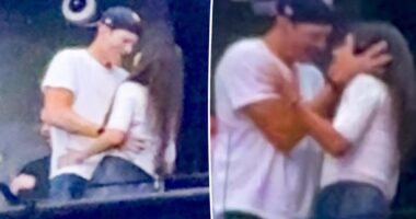 Mila Kunis and Ashton Kutcher show PDA at Backstreet Boys concert