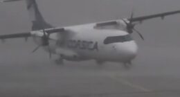 Wind gusts of nearly 100mph nearly overturned a plane stopped on the runway at Cagnano Airport in Corsica