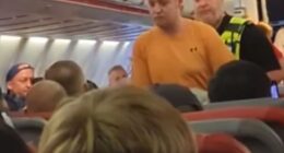 This is the moment passengers on a Jet2 flight erupted into applause as police detained a man after a row with others onboard saw the flight to Alicante diverted back to the UK