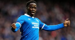A delighted Djeidi Gassama celebrates giving Rangers an early lead at Ibrox
