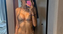 Olivia Attwood has showed off her washboard abs in a skimpy bikini as she shared pictures from her Ibiza trip on Saturday that has left 'in the doghouse with her husband'