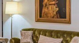 'Portrait of a Lady was pictured hanging over a sofa in a real estate listing posted by Robles Casas & Campos