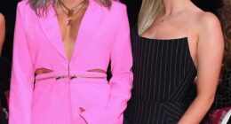 Perrie Edwards has reportedly chosen to keep a song about her ex-bandmate Jesy Nelson on her debut solo album (the pair are pictured together in 2018)