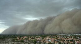 A giant dust storm approached the Phoenix metro area as a monsoon storm pushed dust into the air Monday night