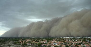 A giant dust storm approached the Phoenix metro area as a monsoon storm pushed dust into the air Monday night