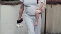 Pregnant Katherine Ryan showed off her growing baby bump as she headed out with her daughter on Friday