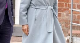 Queen Camilla (pictured) looked typically elegant in a pale blue coat and wide-brimmed cream hat complete with a bow
